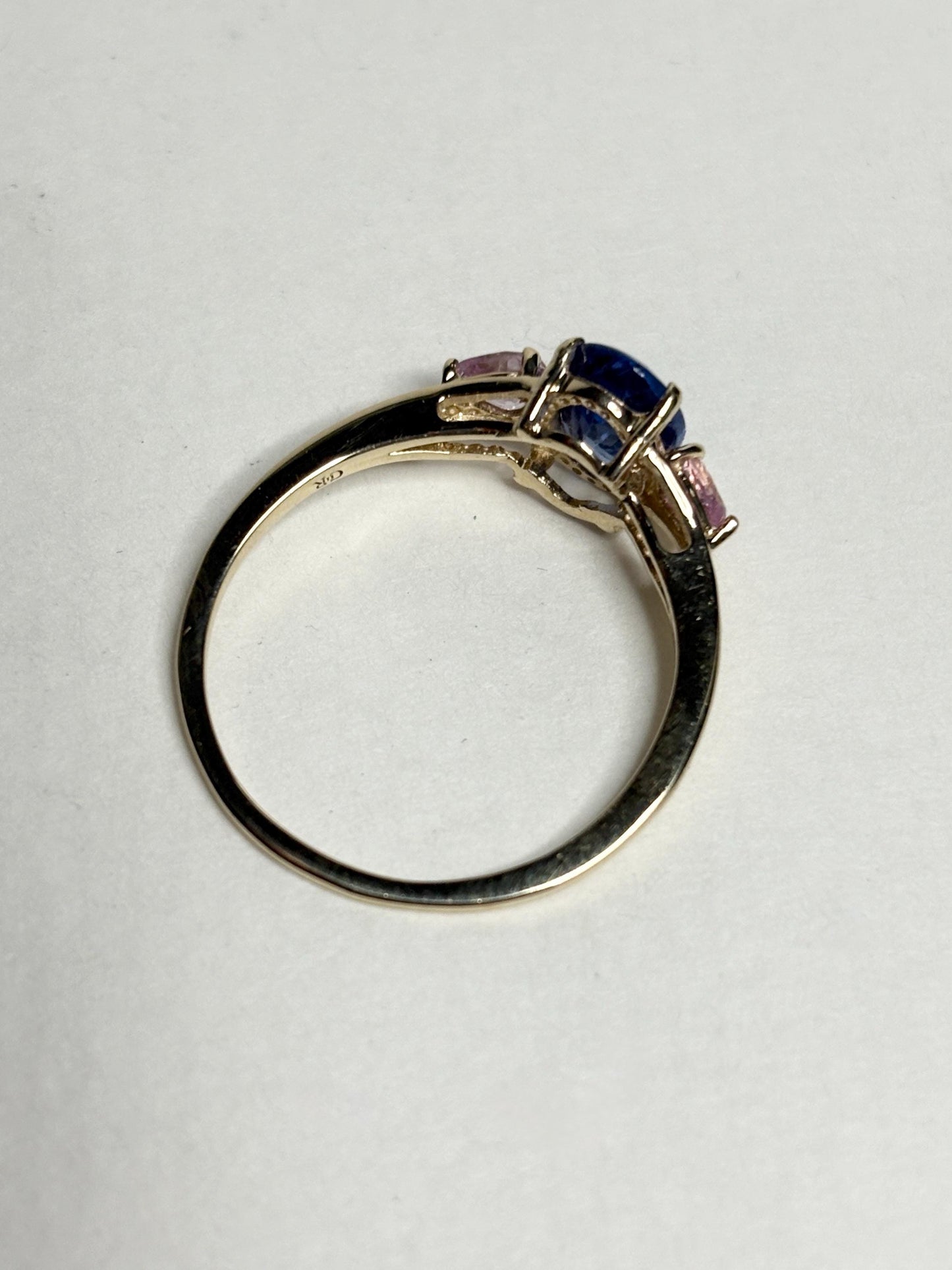 Natural tanzanite and pink sapphire ring in solid 9k gold.