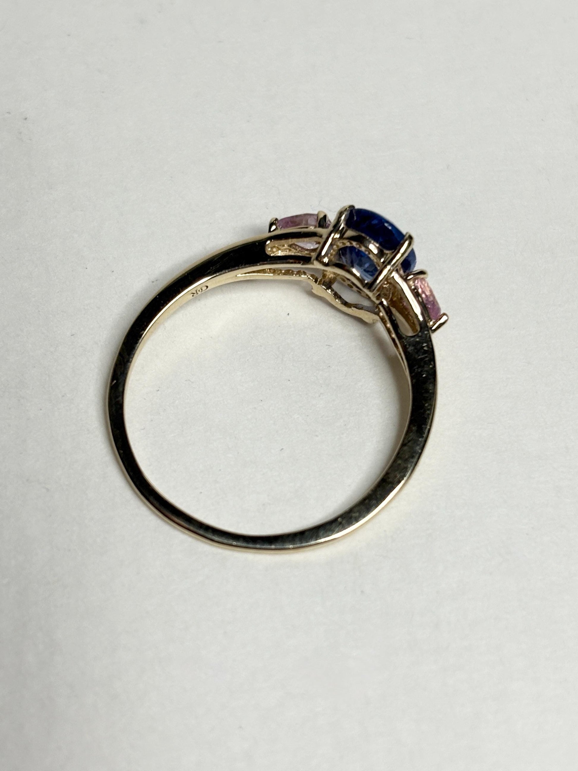 Natural tanzanite and pink sapphire ring in solid 9k gold.