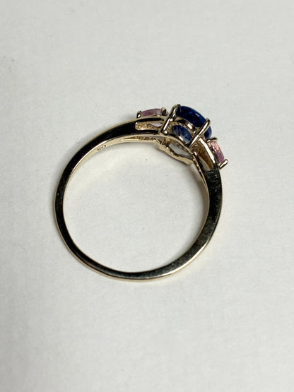 Natural tanzanite and pink sapphire ring in solid 9k gold.