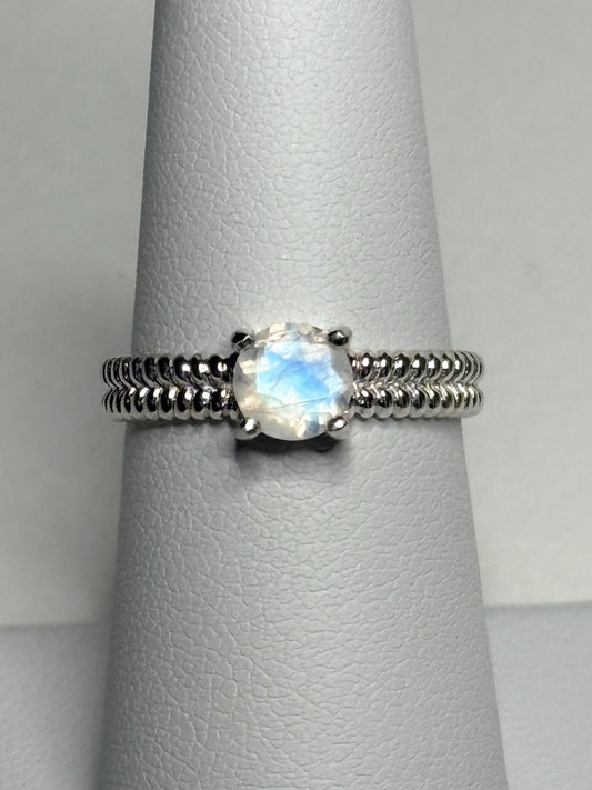 Sterling silver ring with a rainbow moonstone and double rope band.