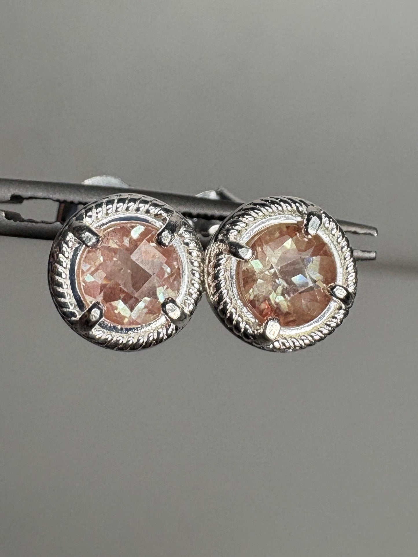 Sterling silver stud earrings with checkerboard faceted andesine and rope design.