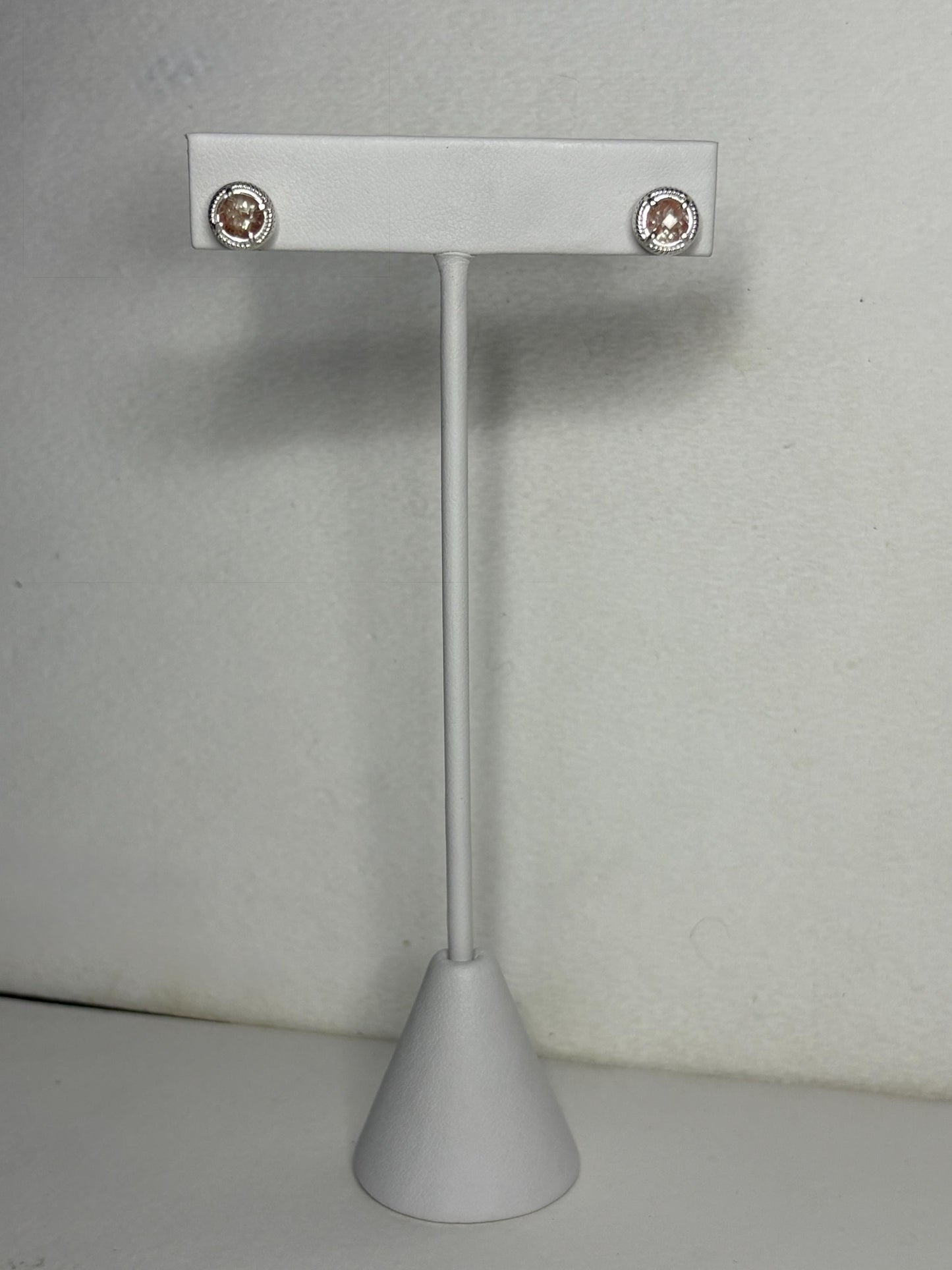 Sterling silver stud earrings with checkerboard faceted andesine and rope design.