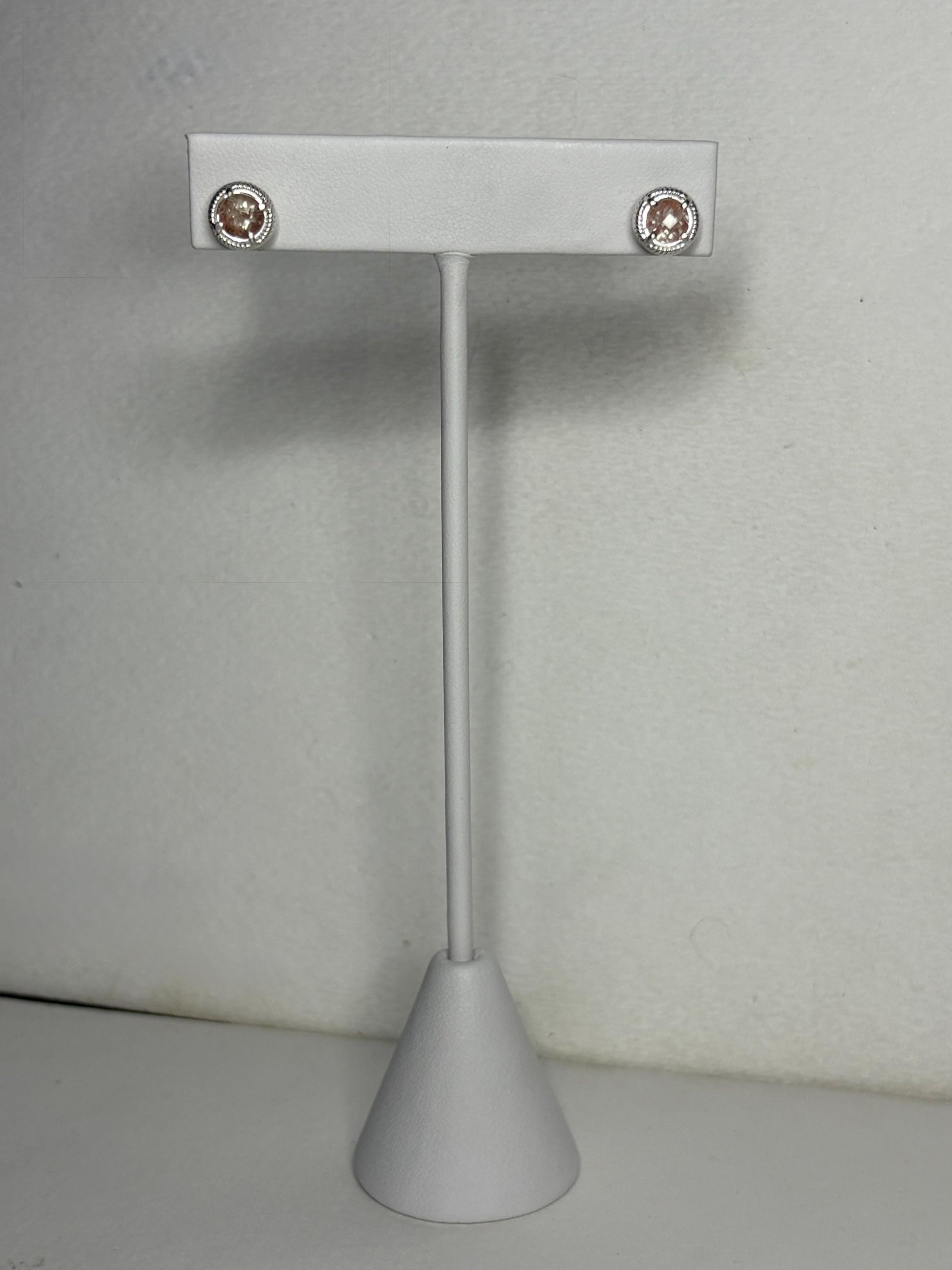 Sterling silver stud earrings with checkerboard faceted andesine and rope design.