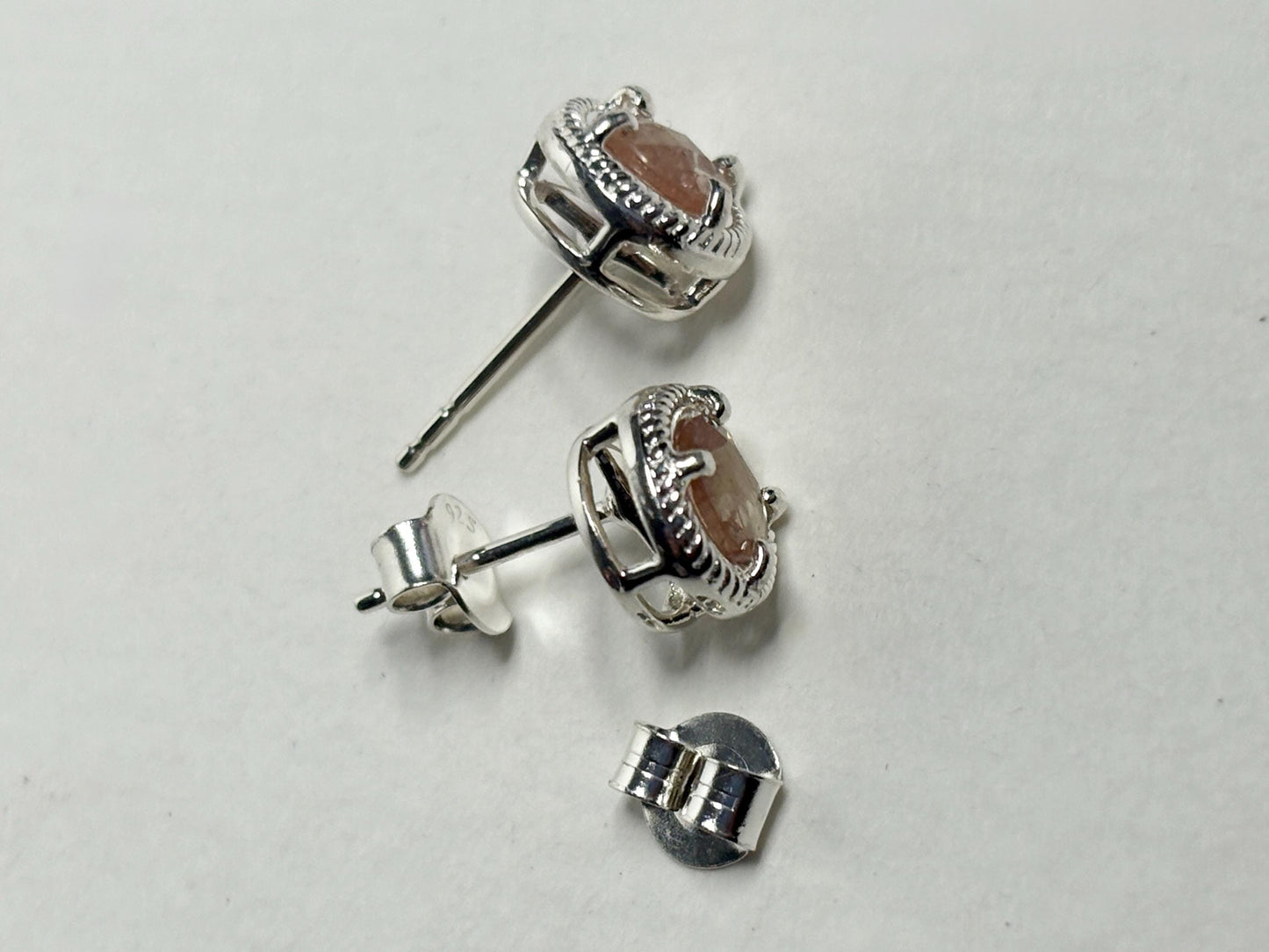 Sterling silver stud earrings with checkerboard faceted andesine and rope design.