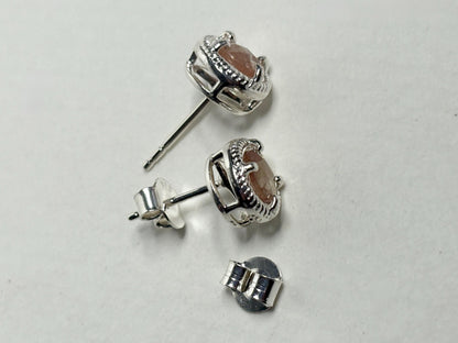 Sterling silver stud earrings with checkerboard faceted andesine and rope design.