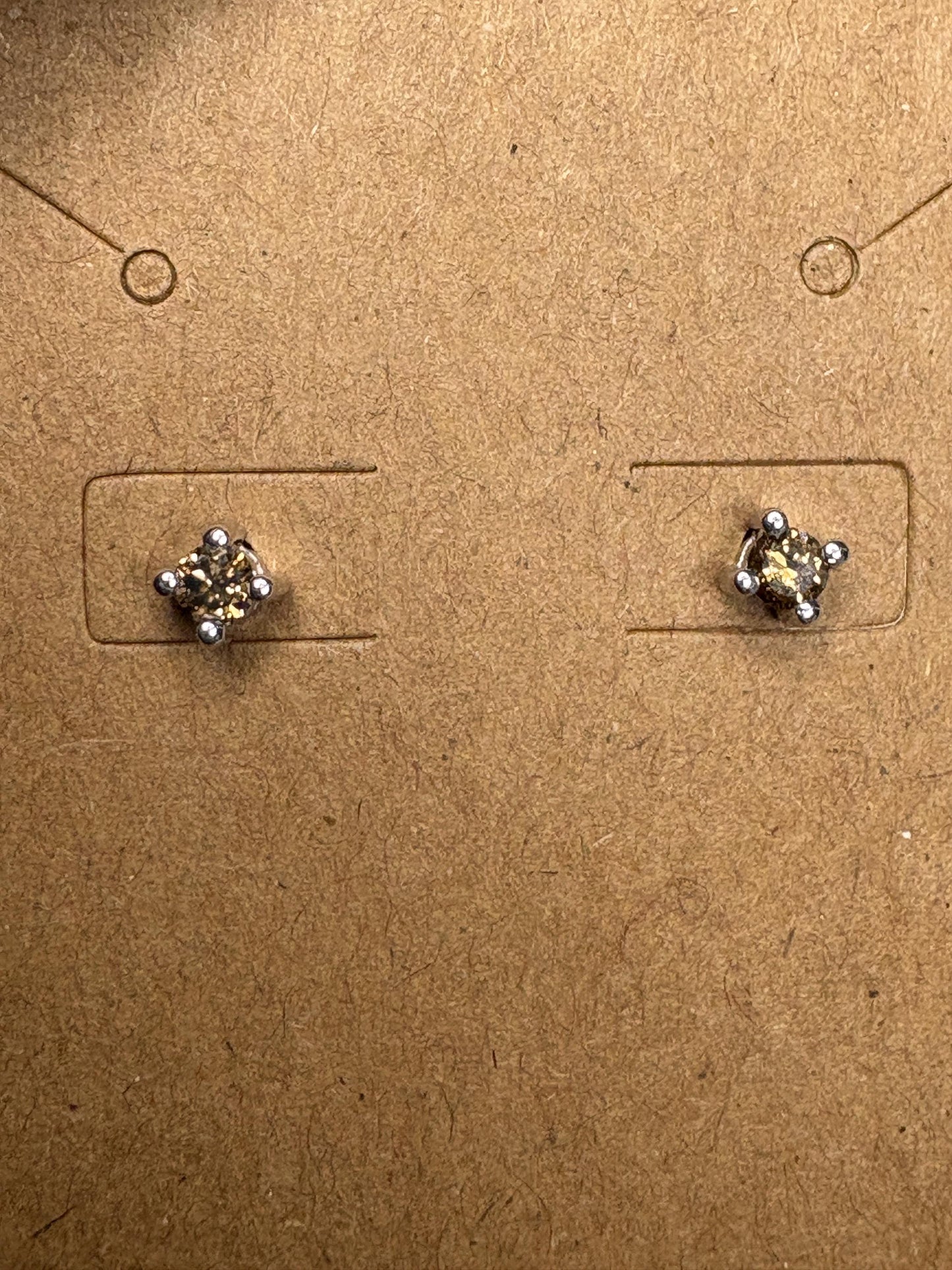 Sterling silver stud earrings with 3mm chocolate champagne colored natural diamonds.