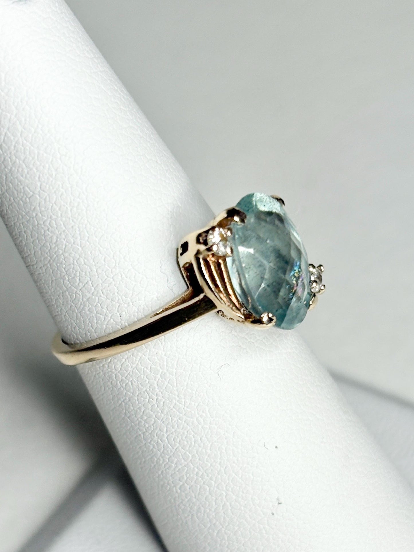 Vintage 10k gold ring with a seafoam aquamarine beryl and natural diamonds.