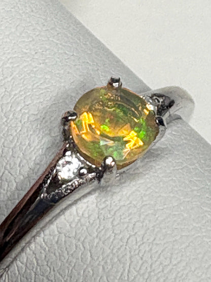Ethiopian opal solitaire ring in sterling silver.