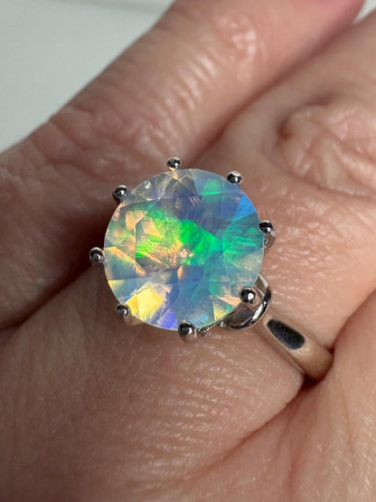 Sterling silver ring with a faceted Ethiopian crystal opal.