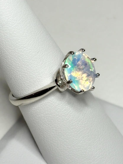 Sterling silver ring with a faceted Ethiopian crystal opal.