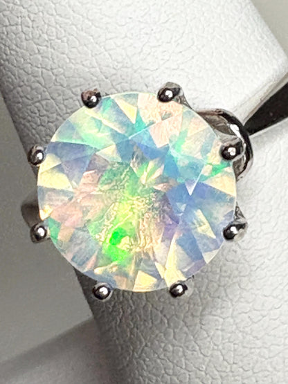 Sterling silver ring with a 10mm faceted Ethiopian crystal opal.