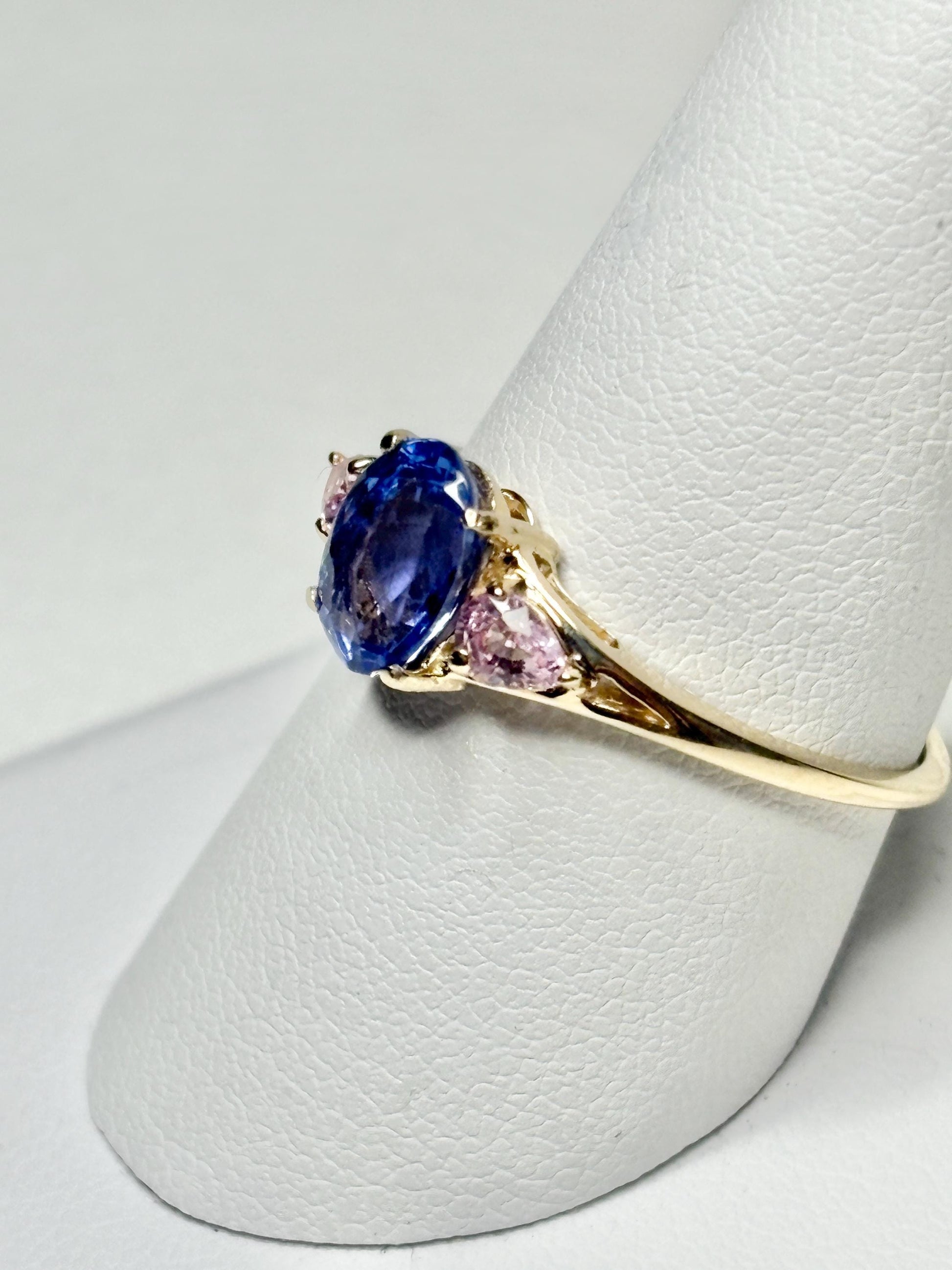 Natural tanzanite and pink sapphire ring in solid 9k gold.