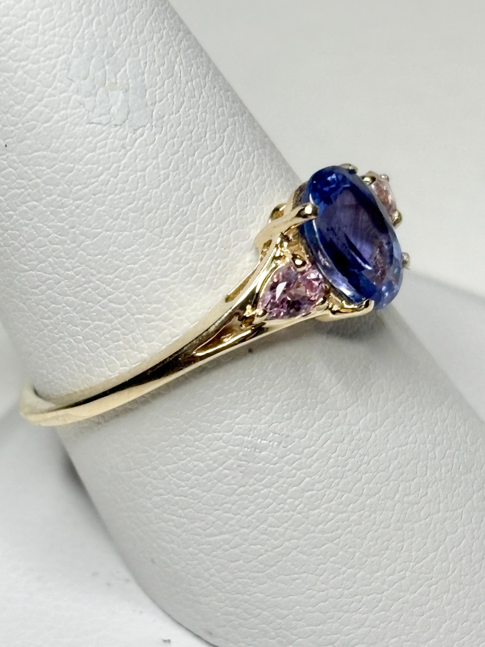 Natural tanzanite and pink sapphire ring in solid 9k gold.