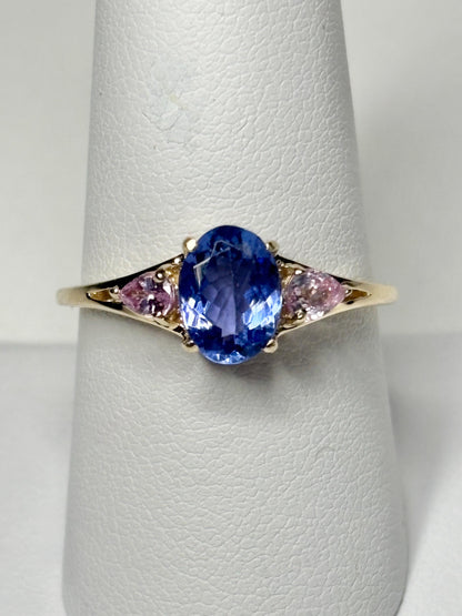 Oval tanzanite and pear pink sapphire ring in 9k gold.
