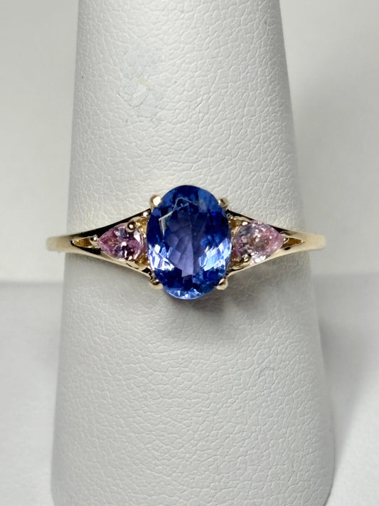Oval tanzanite and pear pink sapphire ring in 9k gold.