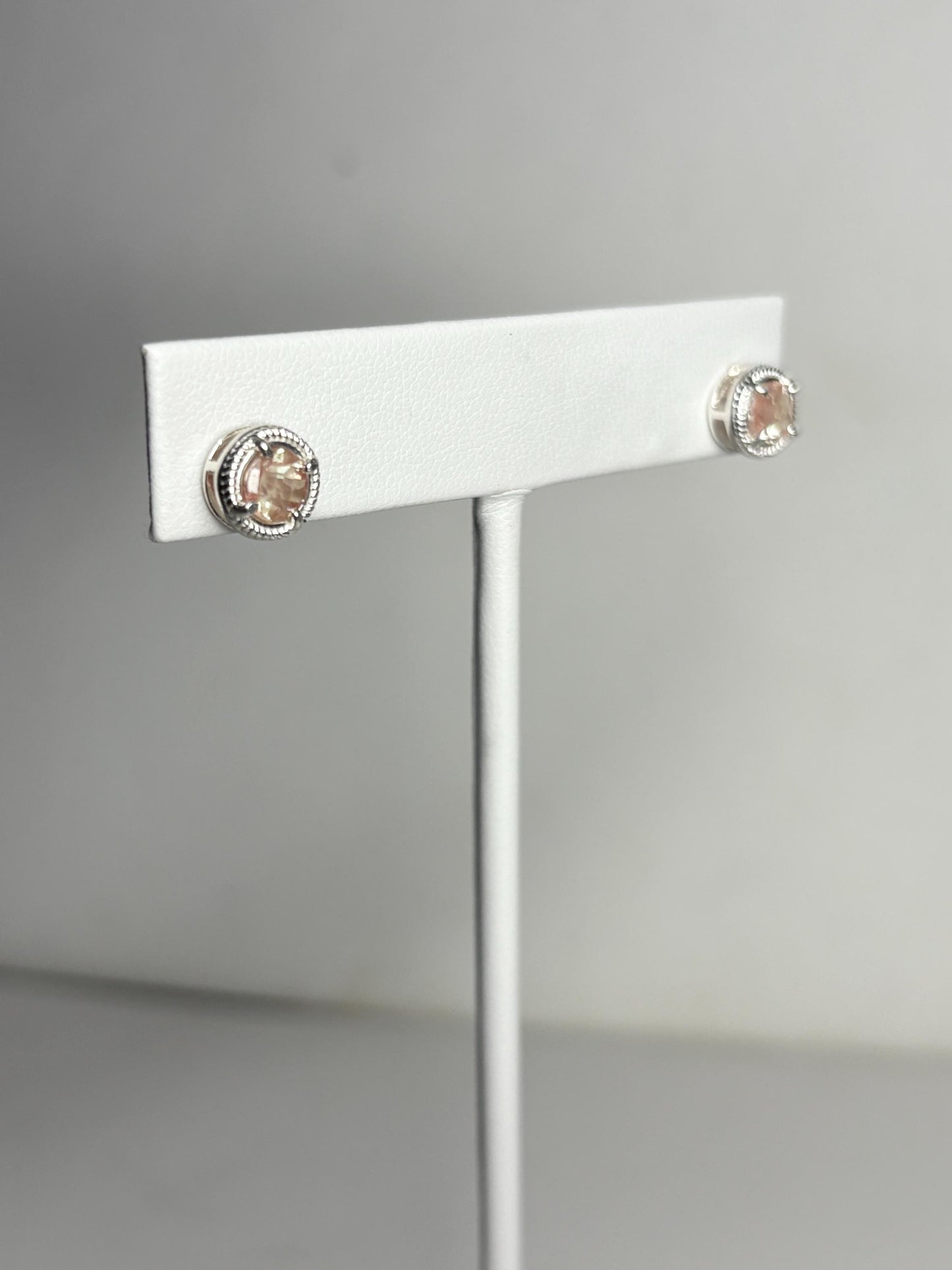 Sterling silver stud earrings with checkerboard faceted andesine and rope design.