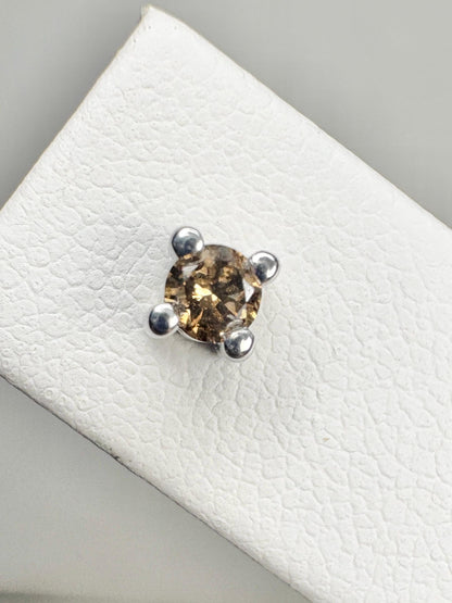 Sterling silver stud earrings with 3mm chocolate champagne colored natural diamonds.