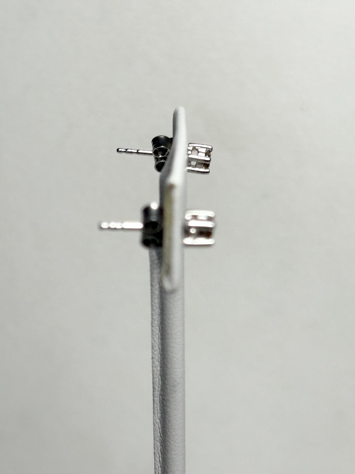 Sterling silver stud earrings with 3mm chocolate champagne colored natural diamonds.