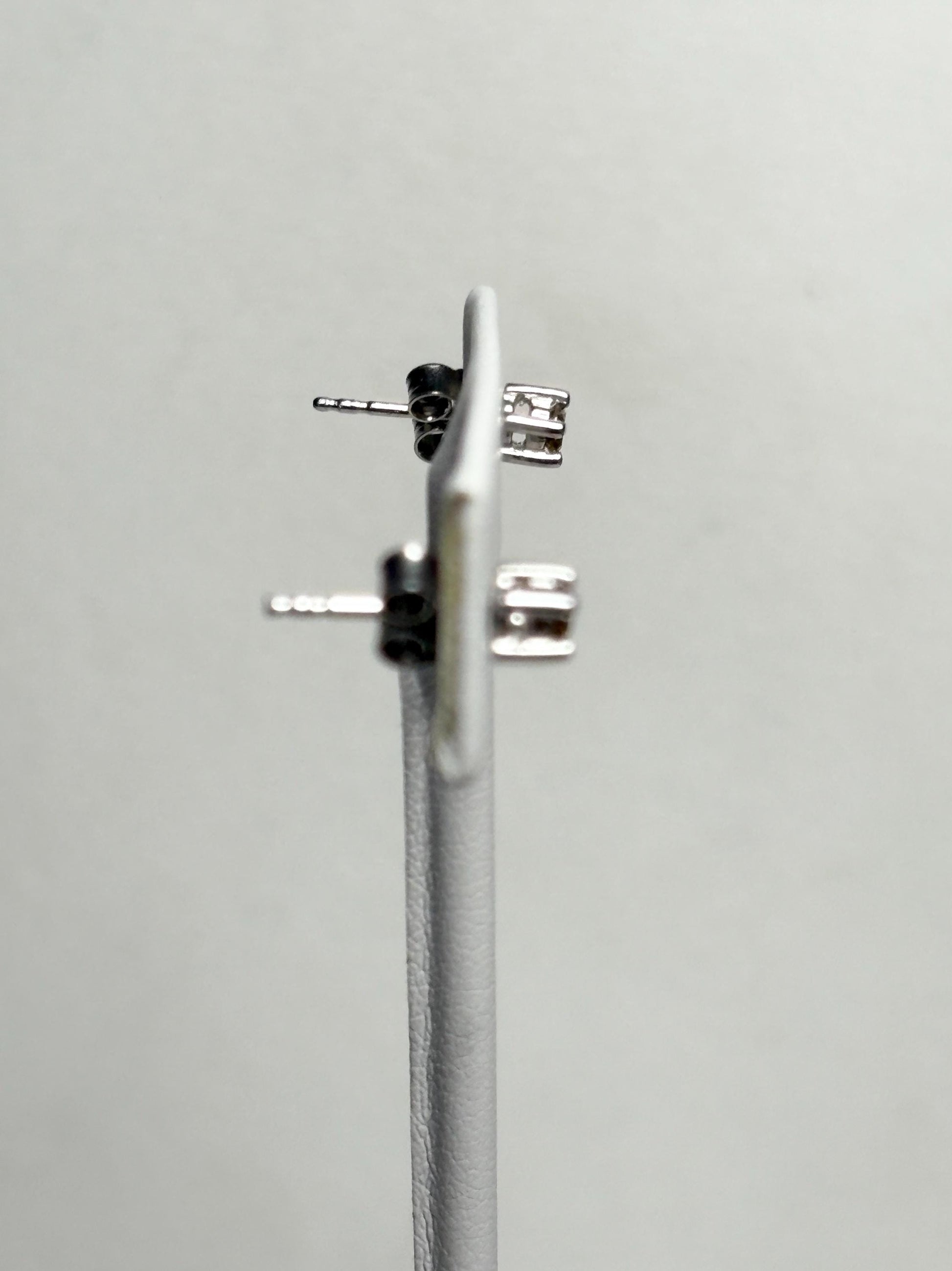 Sterling silver stud earrings with 3mm chocolate champagne colored natural diamonds.