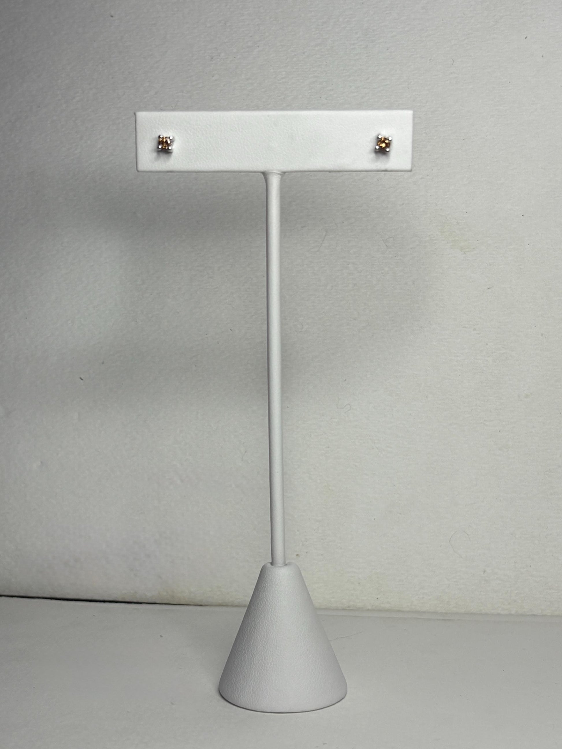 Chocolate champagne colored natural diamond stud earrings in sterling silver.