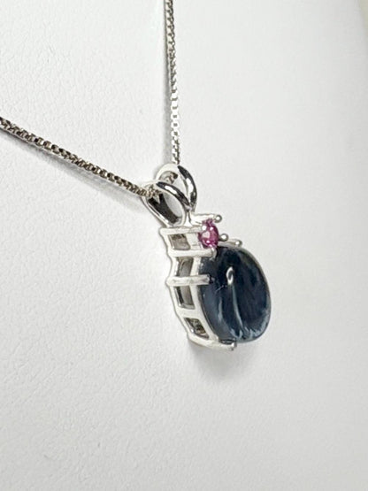 Sterling silver pendant necklace with blue pietersite and rhodolite garnet.