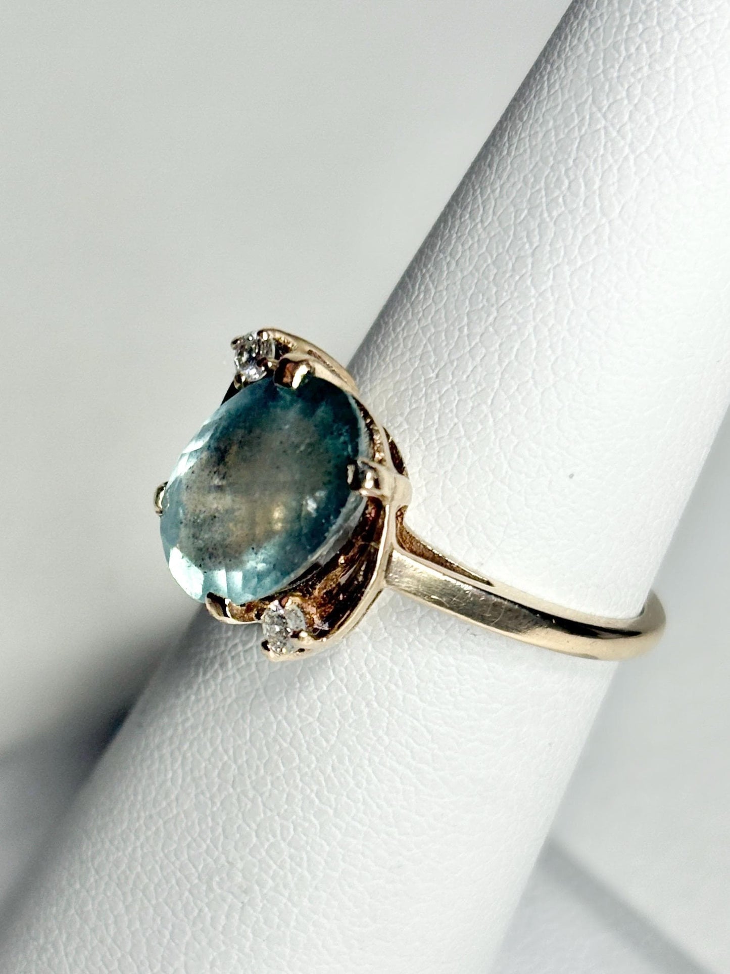 Vintage 10k gold ring with aquamarine beryl and diamonds.
