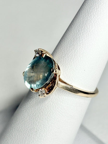Vintage 10k gold ring with aquamarine beryl and diamonds.