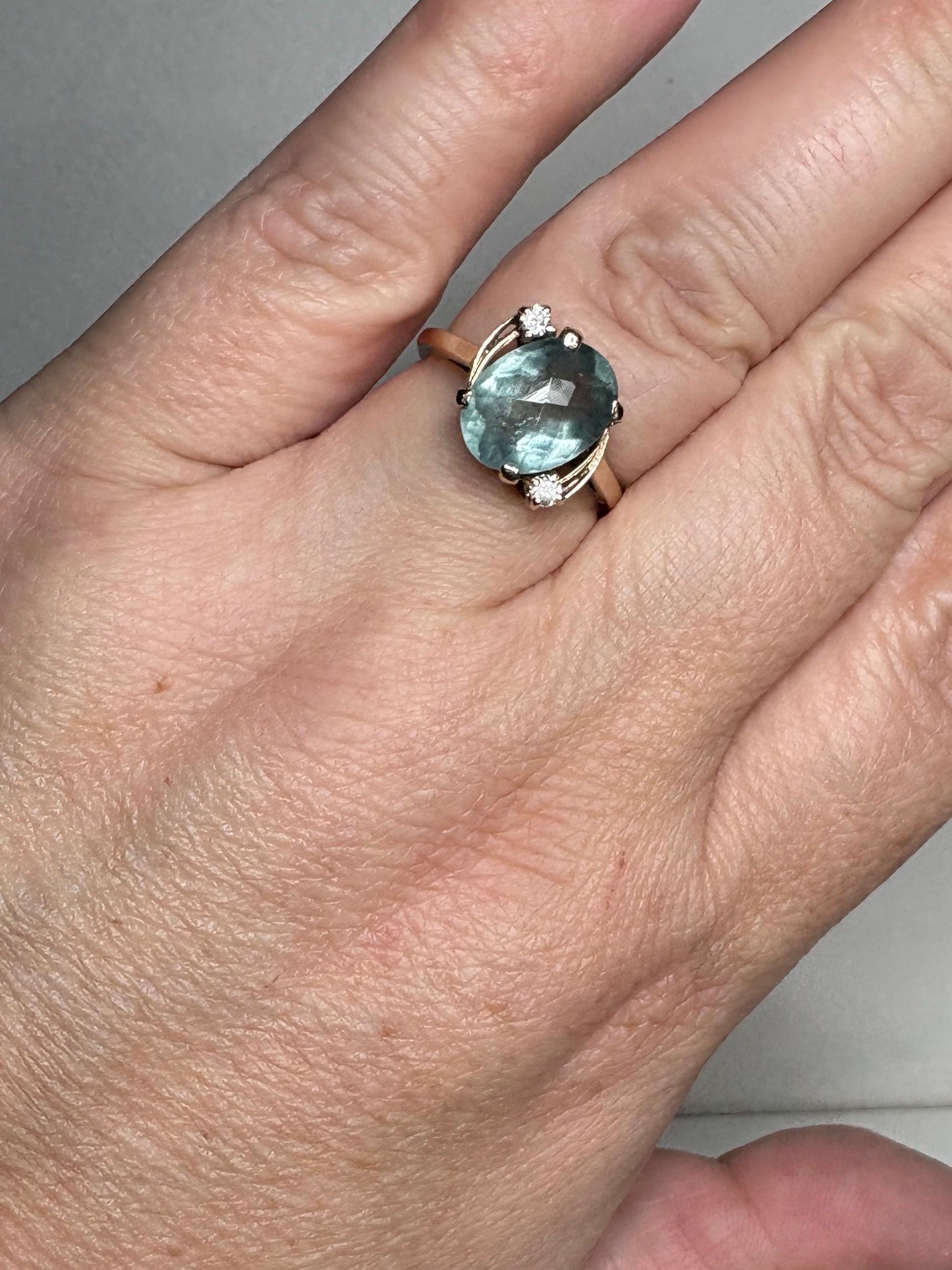 Vintage 10k gold ring with oval seafoam aquamarine beryl and diamonds.
