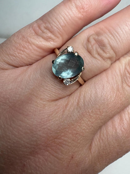 Vintage 10k gold ring with oval seafoam aquamarine and diamonds.