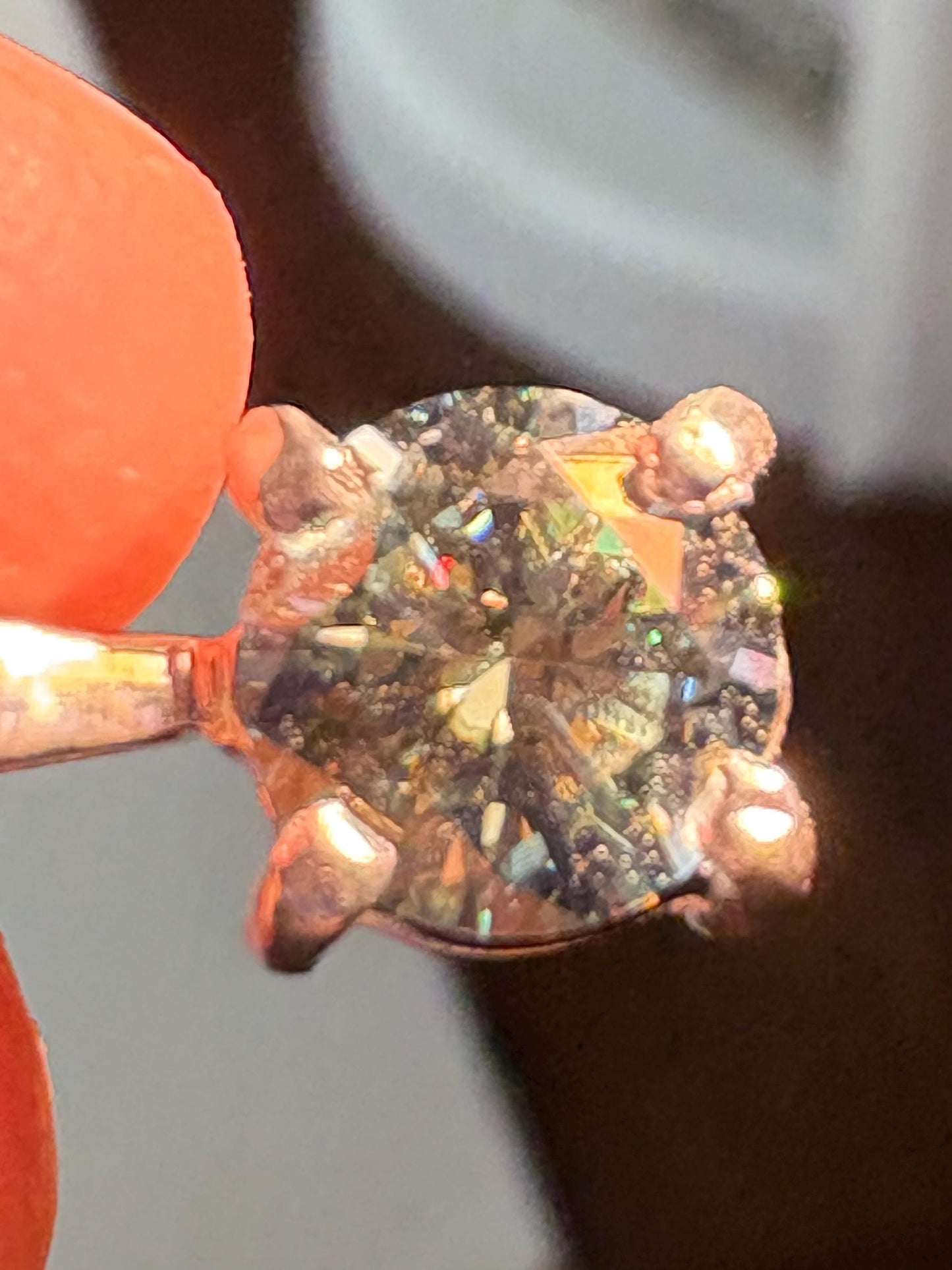 Teal-green moissanite solitaire pendant necklace in sterling silver.