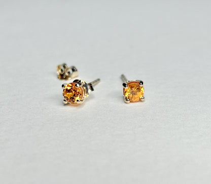 Spessartite garnet stud earrings in solid 9k gold.