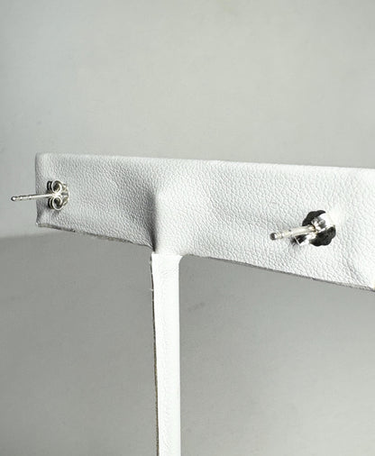 Sterling silver stud earrings with pear-shaped kyanite gems.