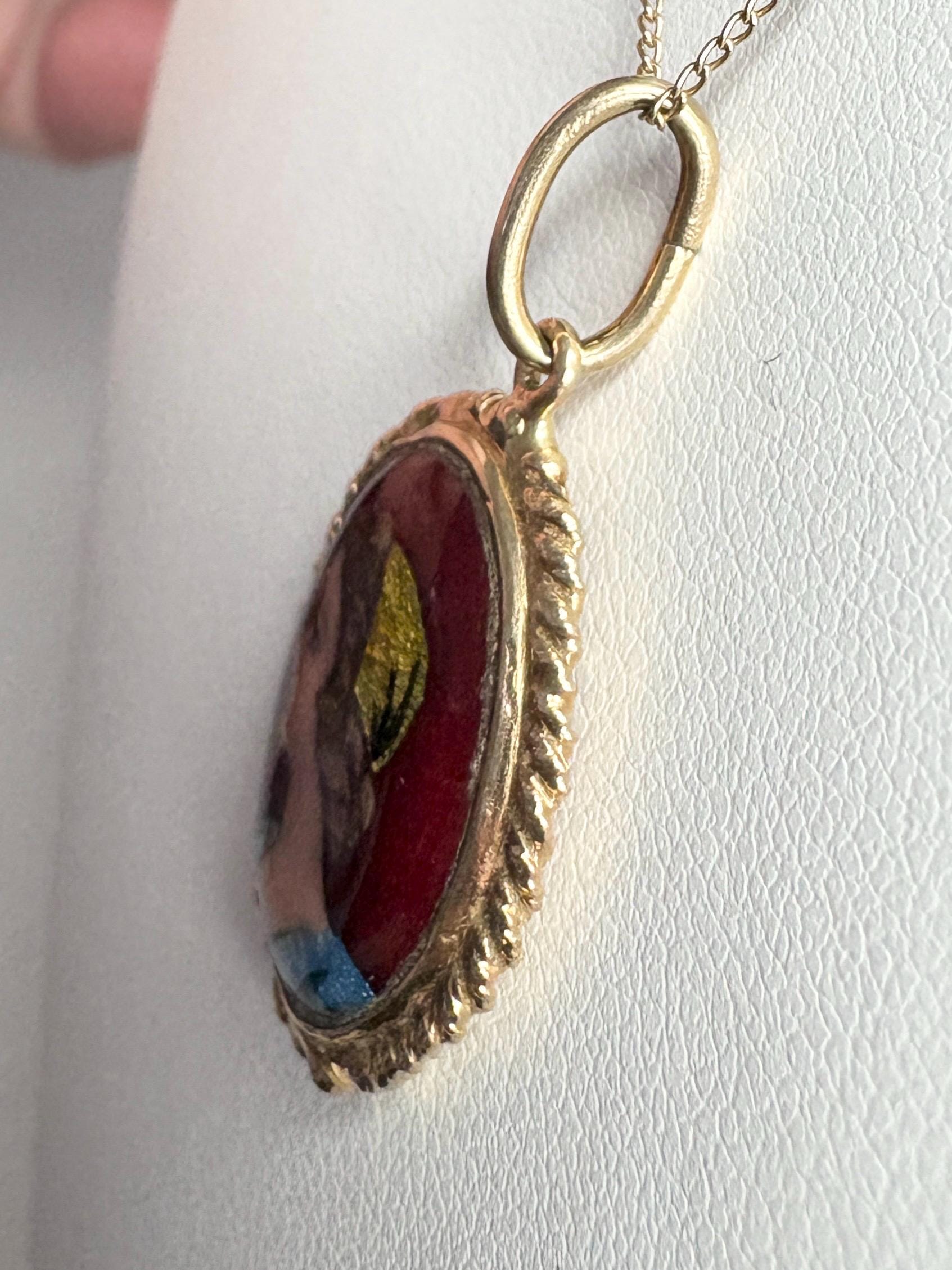 Antique French guilloche enamel lady portrait pendant on a solid gold necklace.