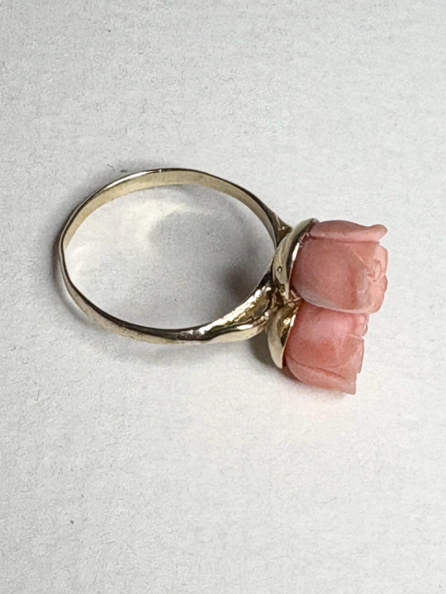 10k gold ring with two angel skin coral rose buds.