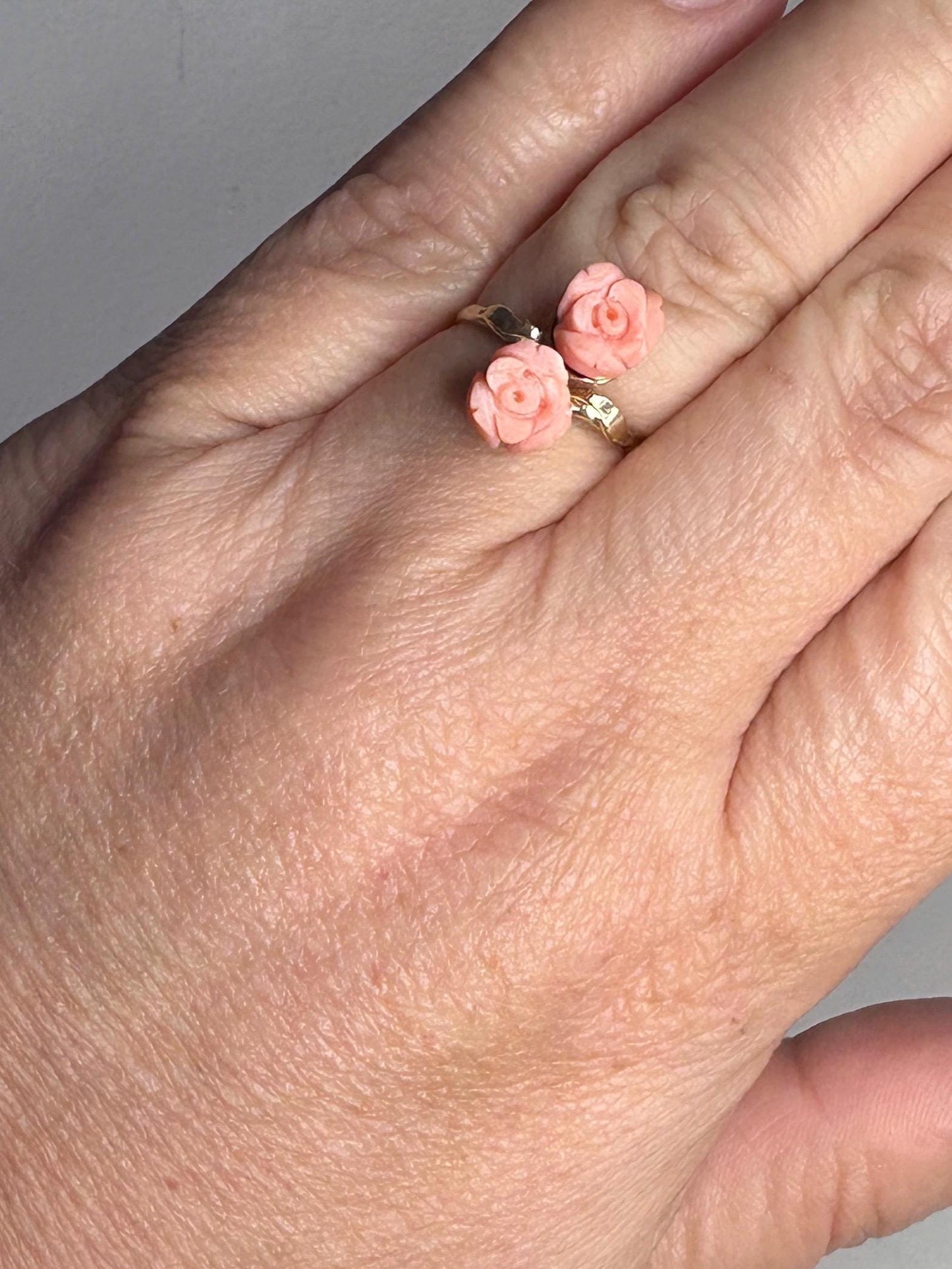 10k gold ring with two angel skin coral rose buds.