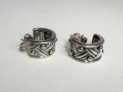 Ann King wide woven hoop earrings in 18k gold and sterling silver.