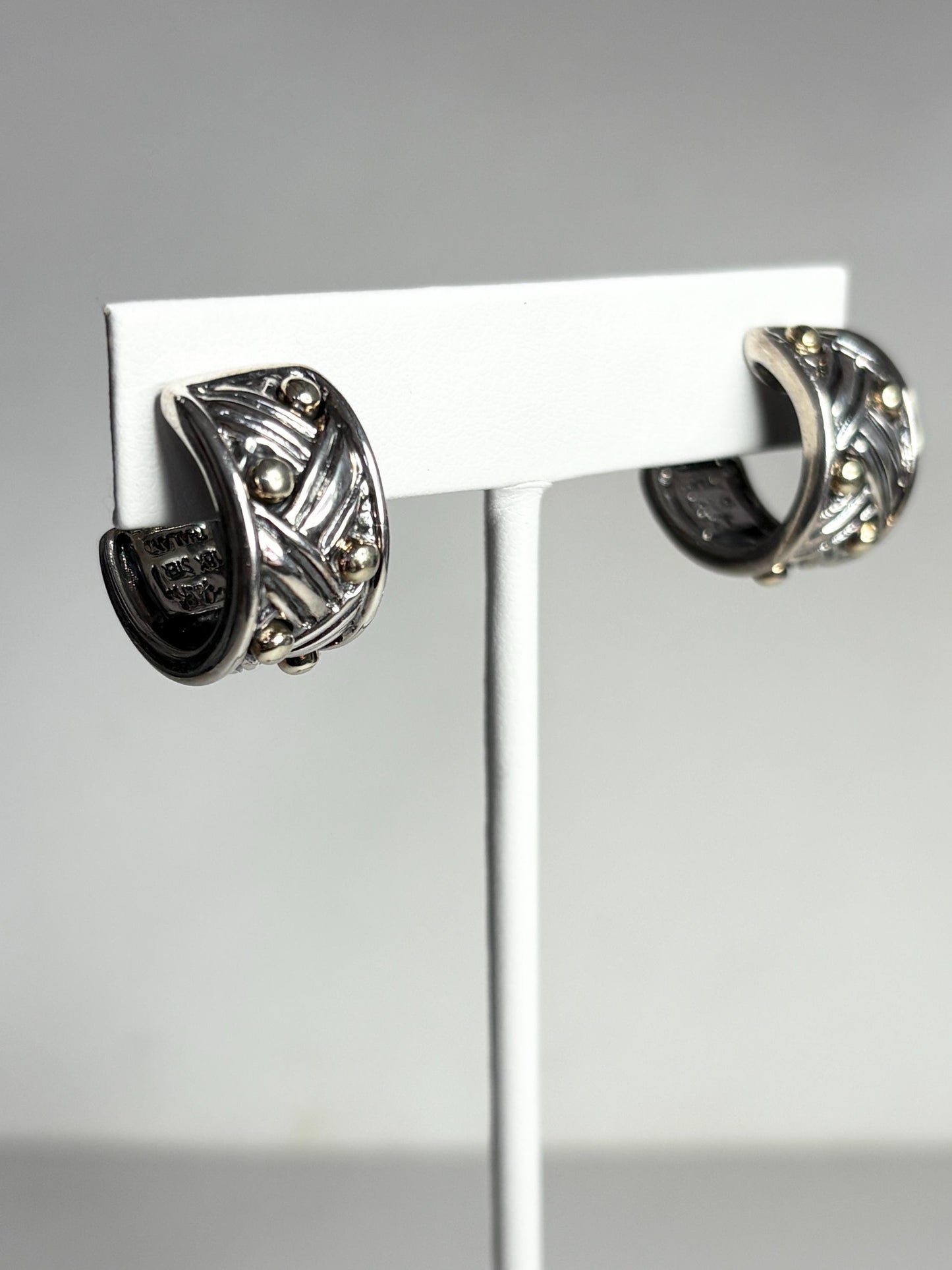 Ann King wide woven hoop earrings in 18k gold and sterling silver.