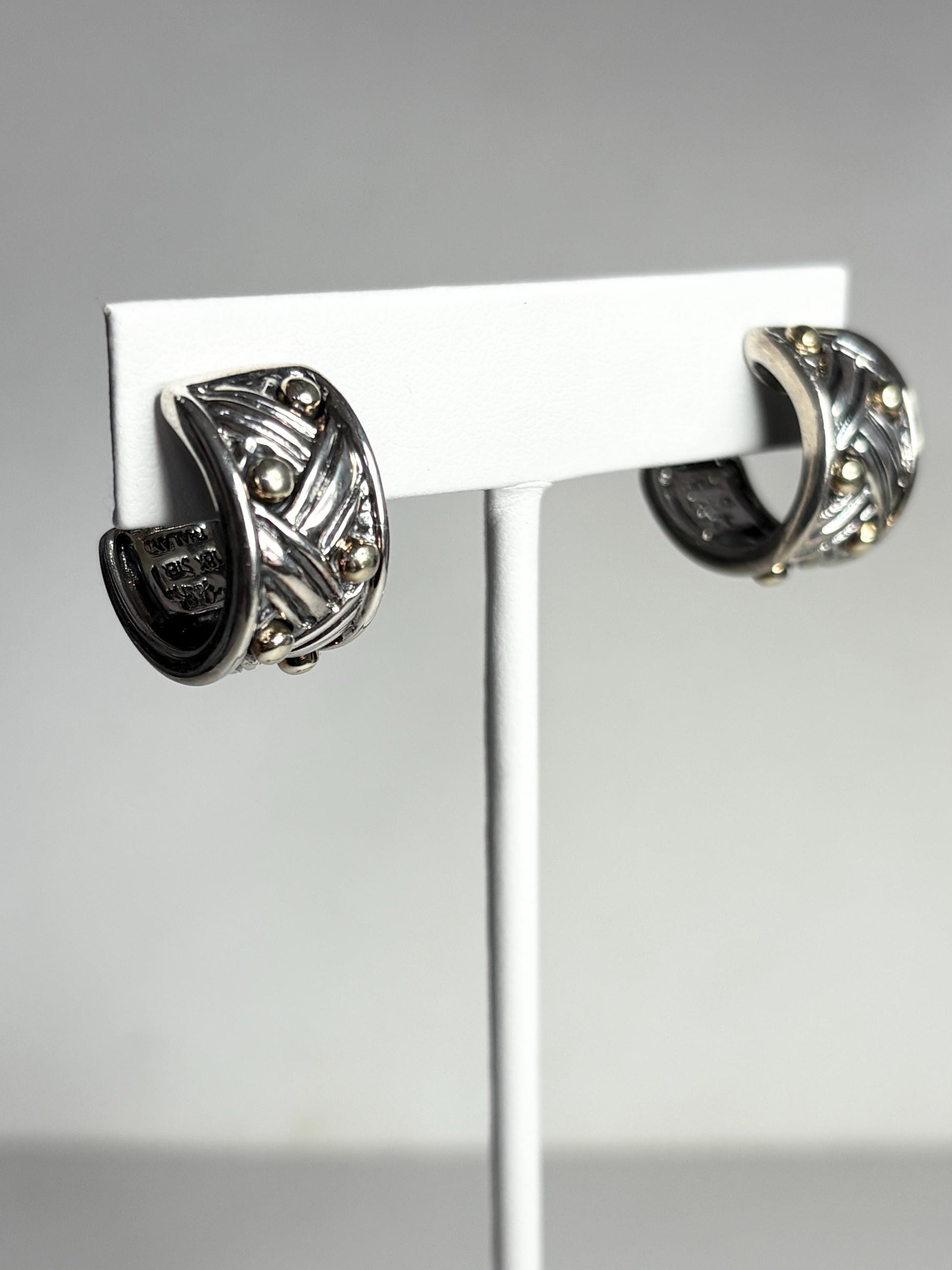Ann King wide woven hoop earrings in 18k gold and sterling silver.