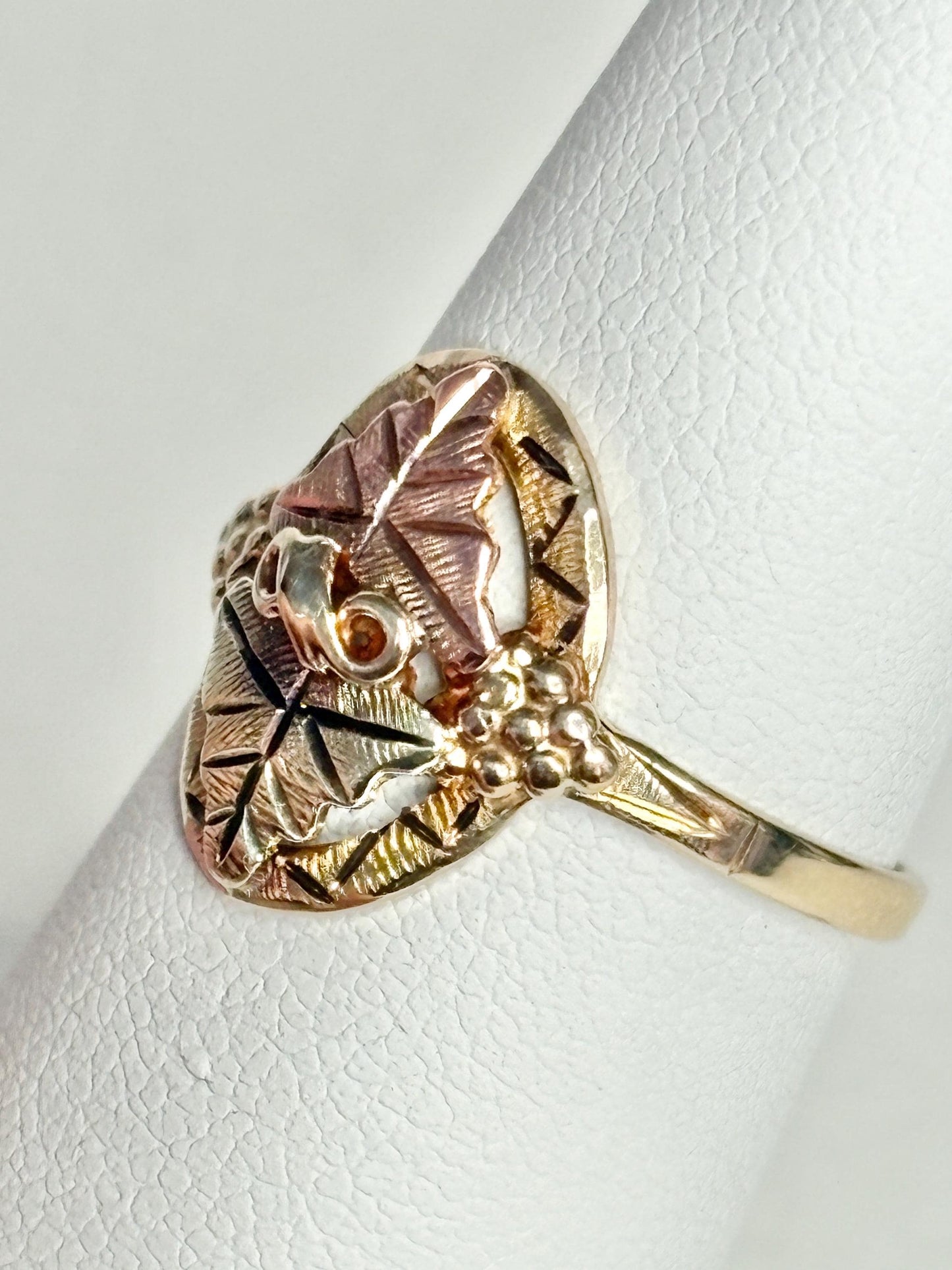 Black Hills Gold ring with 12k leaves on a 10k band.