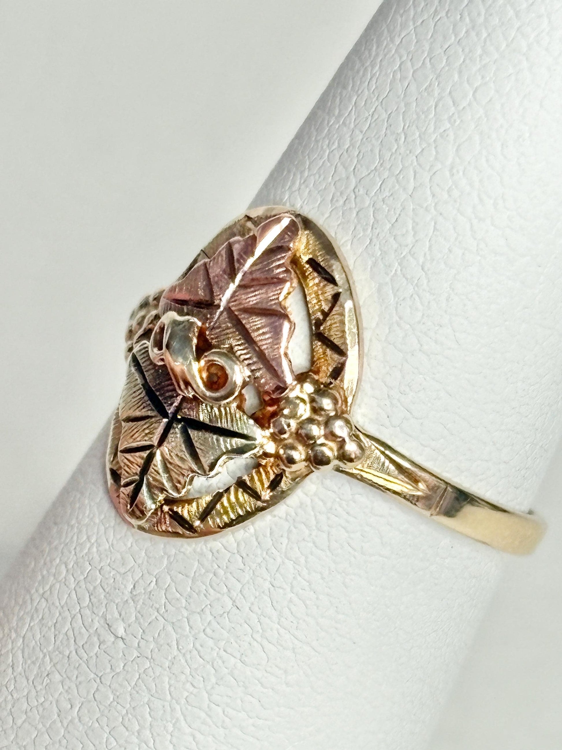 Black Hills Gold ring with 12k leaves on a 10k band.