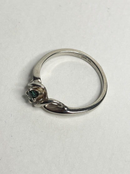 10k white gold band ring with a blue-green tourmaline gemstone.