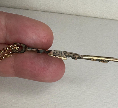 Large ancient Russian bronze cross pendant on an 18 inch gold plated chain.