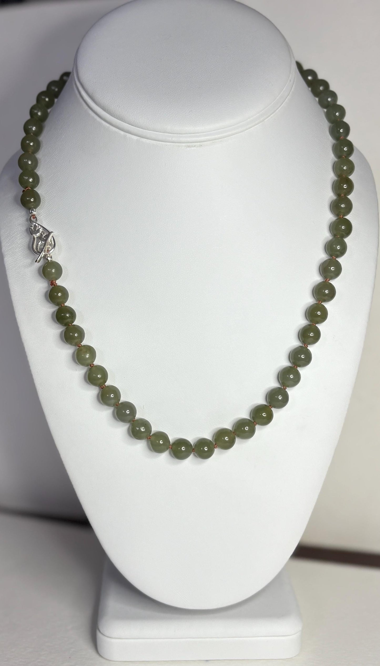 Nephrite Hetian jade beaded necklace with sterling silver toggle clasp.