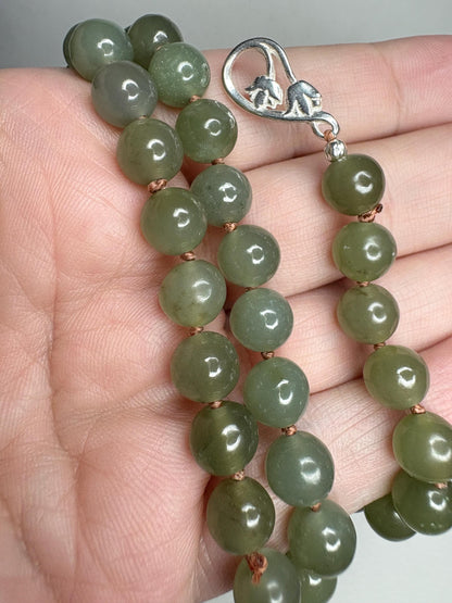 Nephrite Hetian Jade knotted bead bracelet with sterling silver toggle clasp.