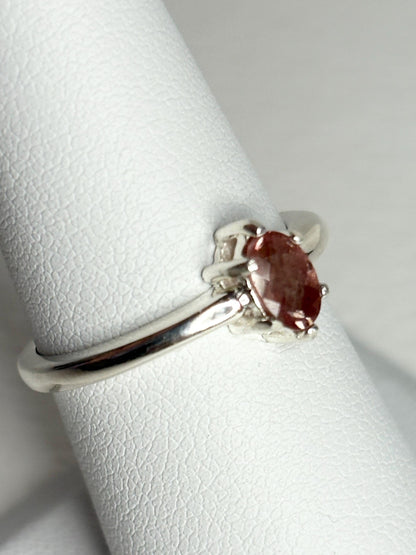 Sterling silver ring with an oval, peach Oregon sunstone.