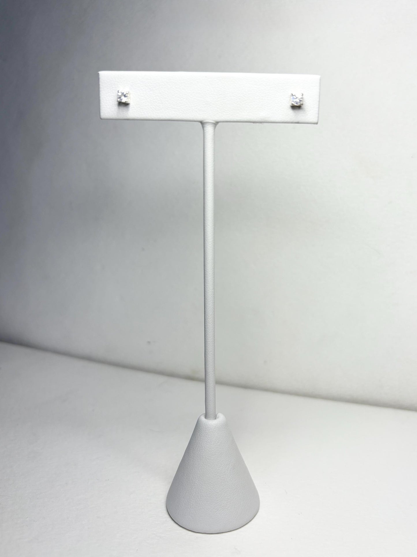 Blue sheen moonstone stud earrings in sterling silver.