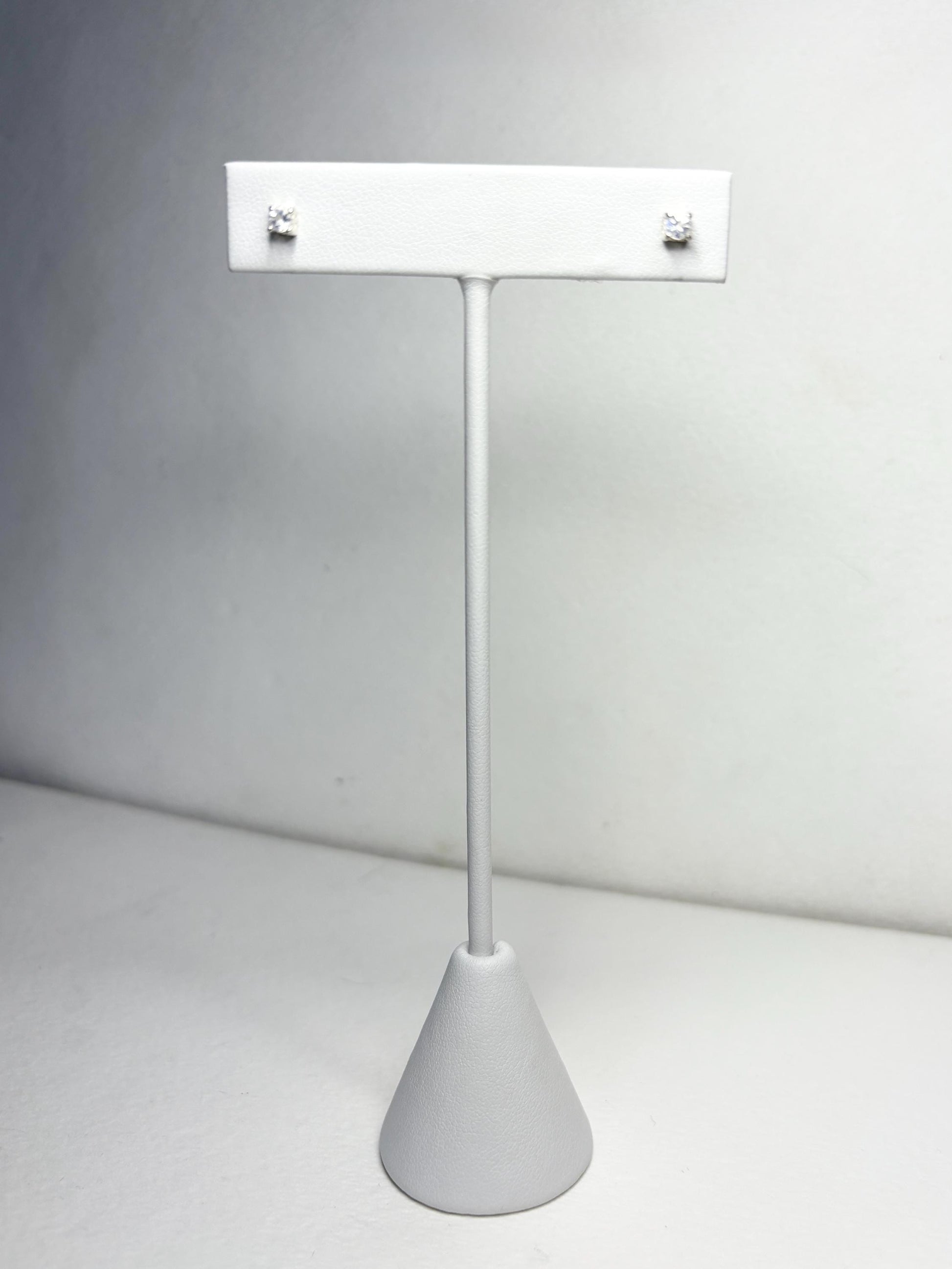 Blue sheen moonstone stud earrings in sterling silver.