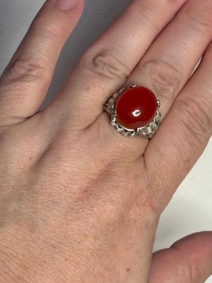 Sterling silver ring with a large oval carnelian cabochon.
