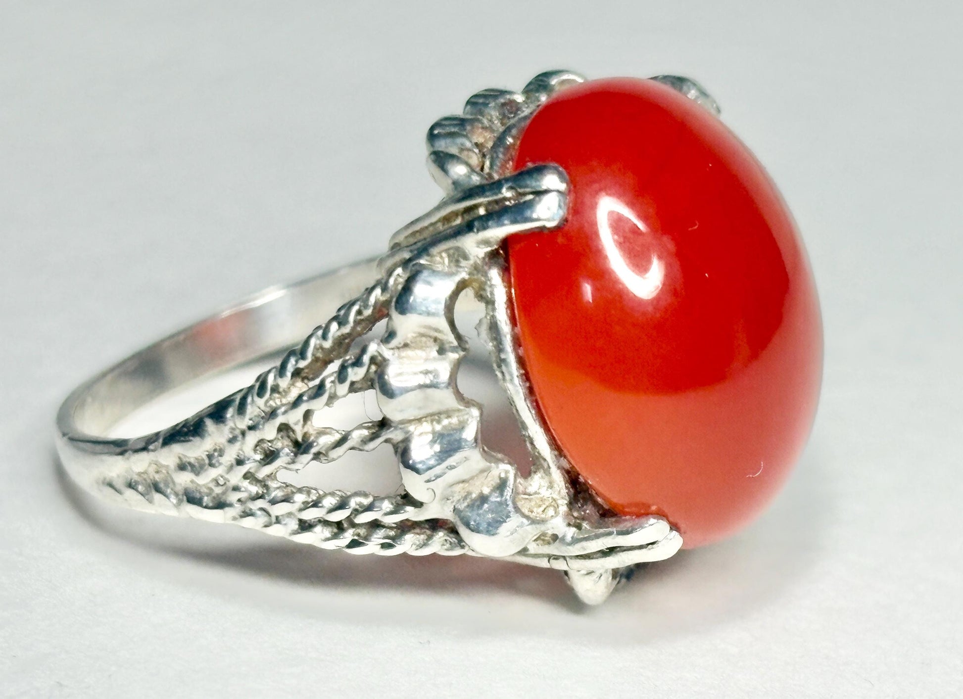 Sterling silver ring with a large oval carnelian cabochon.