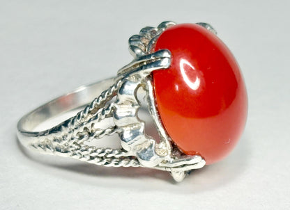 Sterling silver ring with a large oval carnelian cabochon.